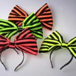 VINCHA MOÑO TELA FLUO RAYAS X1