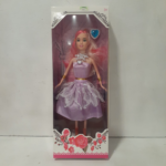 MUÑECA CON VESTIDO X1